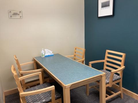 A rectangular table with 4 chairs